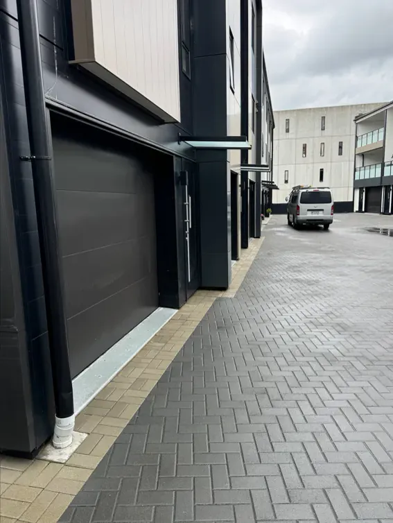 Townhouse driveway, herringbone pavers: after